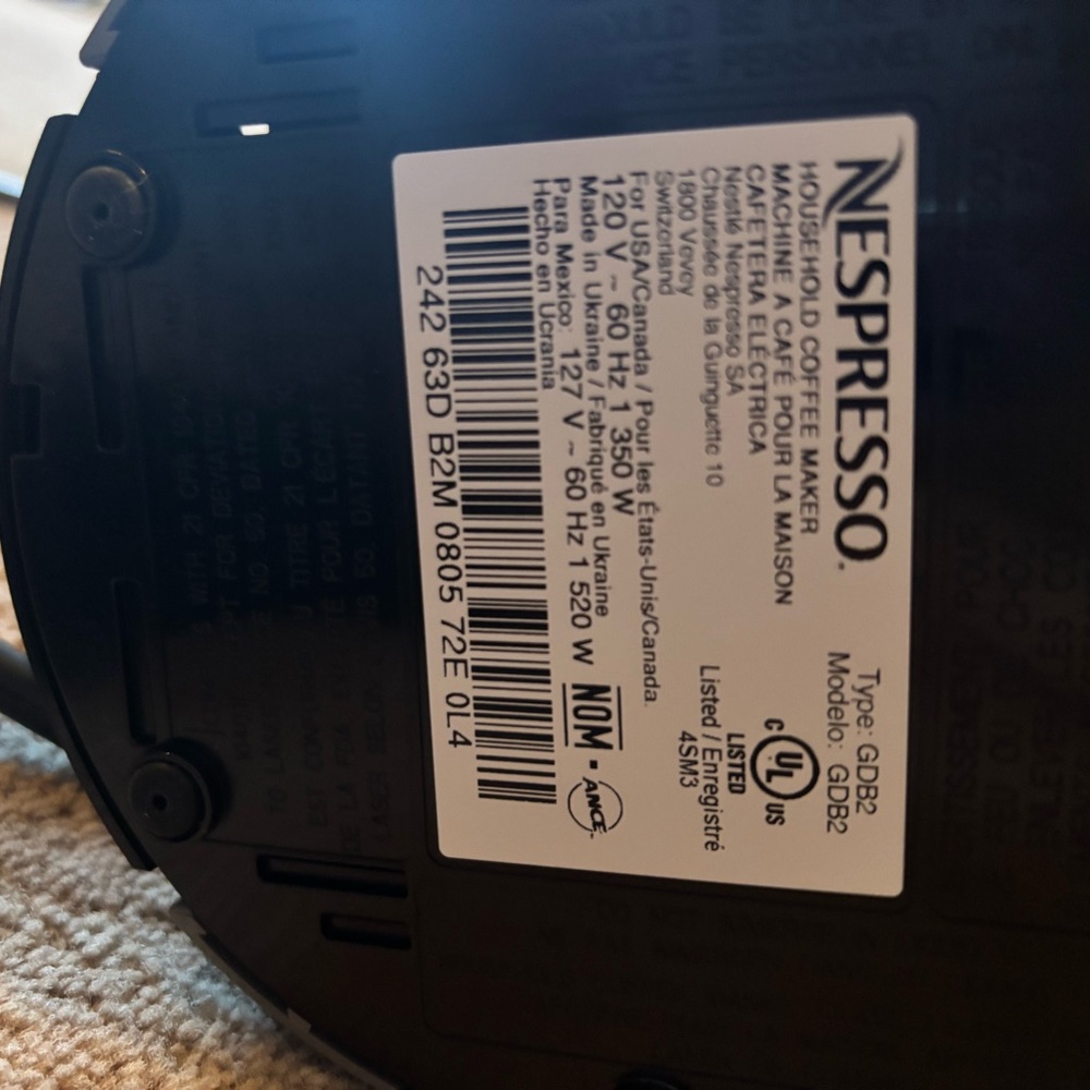 Nespresso Vertuo Plus machine black and gray